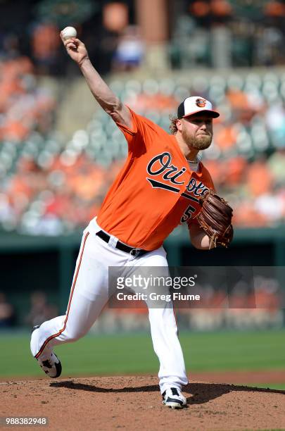 Andrew Cashner of the Baltimore Orioles pitches in the second inning against the Los Angeles Angels at Oriole Park at Camden Yards on June 30, 2018...