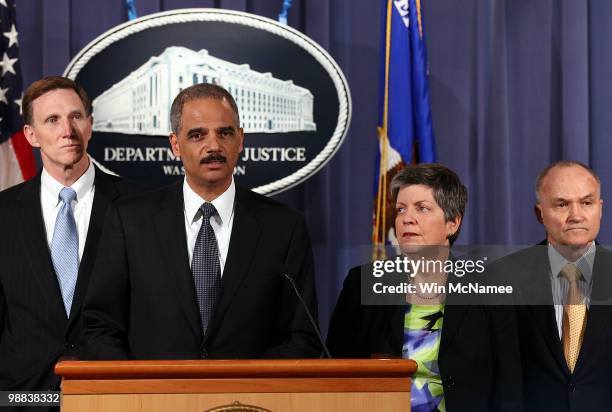 Attorney General Eric Holder holds a press conference at Department of Justice headquarters regarding the investigation into the recent attempted...