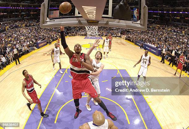 LaMarcus Aldridge of the Portland Trail Blazers goes up for a shot against Pau Gasol of the Los Angeles Lakers during the game at Staples Center on...