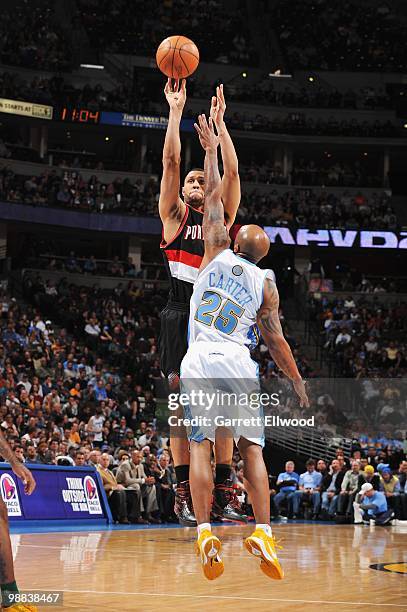Brandon Roy of the Portland Trail Blazers takes a jump shot against Anthony Carter of the Denver Nuggets during the game on April 1, 2010 at the...