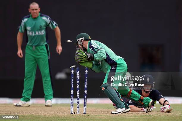 Craig Kieswetter of England is run out by Niall O'Brien of Ireland during the ICC T20 World Cup Group D match between England and Ireland at the...