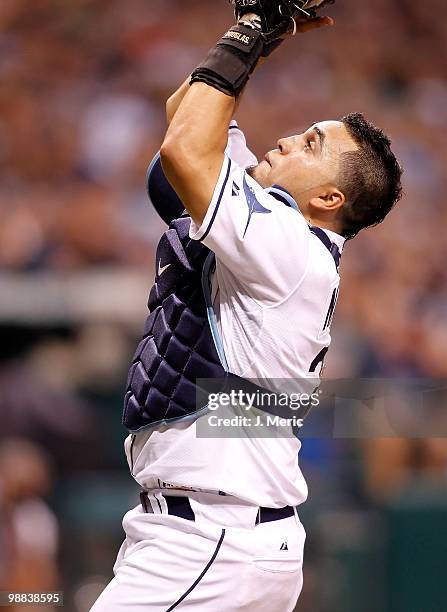 Catcher Dioner Navarro of the Tampa Bay Rays catches a foul ball against the Kansas City Royals during the game at Tropicana Field on May 1, 2010 in...