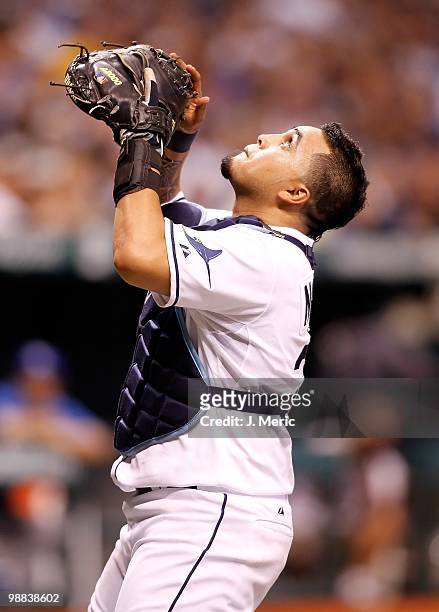 Catcher Dioner Navarro of the Tampa Bay Rays catches a foul ball against the Kansas City Royals during the game at Tropicana Field on May 1, 2010 in...