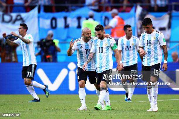 Javier Mascherano of Argentina talks with teammate Lionel Messi during the 2018 FIFA World Cup Russia Round of 16 match between France and Argentina...