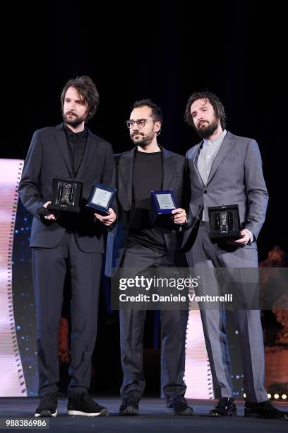 Damiano DInnocenzo, Giuseppe Soleri and Fabio DInnocenzo are awarded during the Nastri D'Argento Award Ceremony on June 30, 2018 in Taormina, Italy.