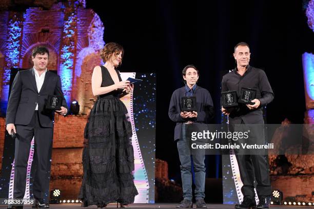 Edoardo Pesce, Carlotta Proietti, Marcello Fonte and Matteo Garrone are awarded during the Nastri D'Argento Award Ceremony on June 30, 2018 in...
