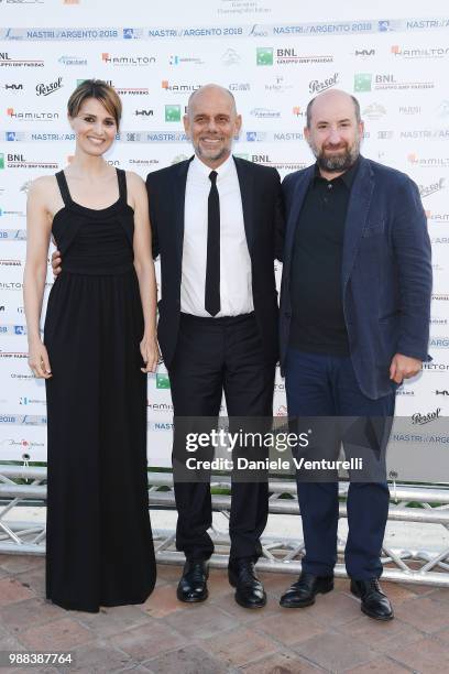 Paola Cortellesi, Riccardo Milani and Antonio Albanese attend the Nastri D'Argento cocktail party on June 30, 2018 in Taormina, Italy.