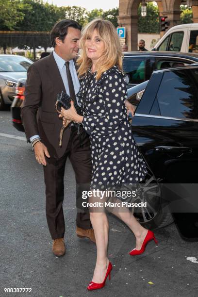 Actress Emmanuelle Seigner attends the Miu Miu 2019 Cruise Collection Show at Hotel Regina on June 30, 2018 in Paris, France.