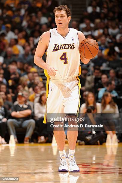 Luke Walton of the Los Angeles Lakers moves the ball against the San Antonio Spurs during the game at Staples Center on April 4, 2010 in Los Angeles,...