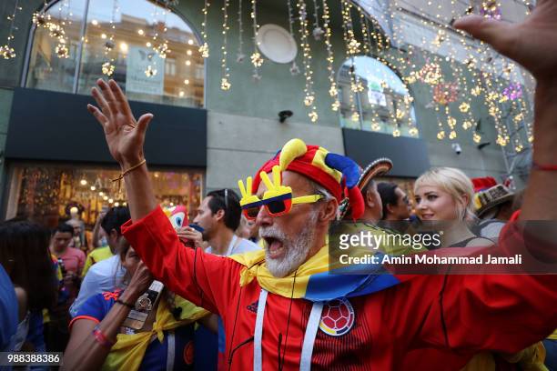 Fans looks on from the street in central Moscow during the 2018 Worldcup on June 30, 2018 in Moscow, Russia.