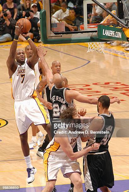 Lamar Odom of the Los Angeles Lakers shoots against Richard Jefferson of the San Antonio Spurs during the game at Staples Center on April 4, 2010 in...