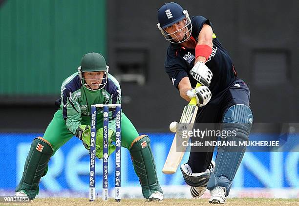 Ireland cricketer Niall O'Brien looks on as England cricketer Kevin Pietersen plays a shot during their match in the ICC World Twenty20 2010 at the...
