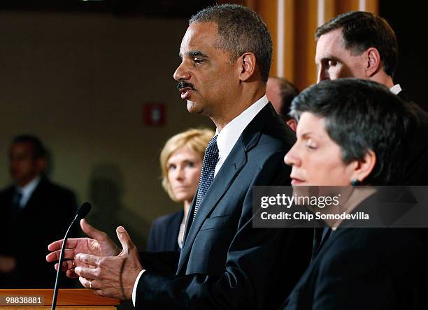 Attorney General Eric Holder holds a press conference at Department of Justice headquarters regarding the investigation into the recent attempted...