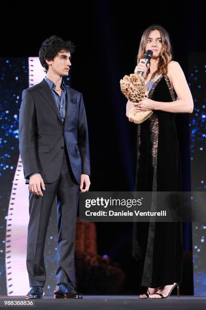 Luigi Fedele, is awarded by Kasia Smutniak, during the Nastri D'Argento Award Ceremony on June 30, 2018 in Taormina, Italy.