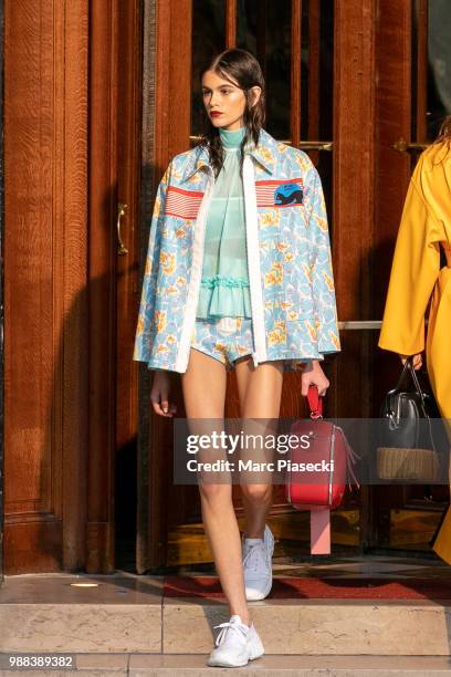 Model Kaia Gerber walks the runway during Miu Miu 2019 Cruise Collection Show at Hotel Regina on June 30, 2018 in Paris, France.