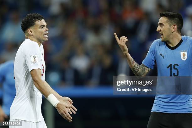 Pepe of Portugal, Matias Vecino of Uruguay during the 2018 FIFA World Cup Russia round of 16 match between Uruguay and at the Fisht Stadium on June...