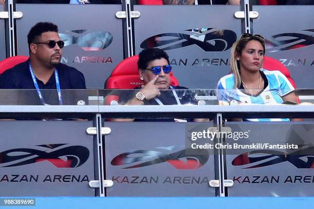 Ronaldo, Diego Maradona and his girlfriend Rocio Oliva look on during the 2018 FIFA World Cup Russia Round of 16 match between France and Argentina...