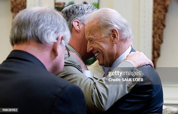 Vice President Joe Biden greets Rhode Island Democrat Senator Sheldon Whitehouse after announcing $220 million in Recovery Act awards that will be...