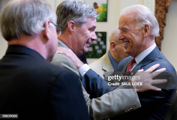 Vice President Joe Biden greets Rhode Island Democrat Senator Sheldon Whitehouse after announcing $220 million in Recovery Act awards that will be...