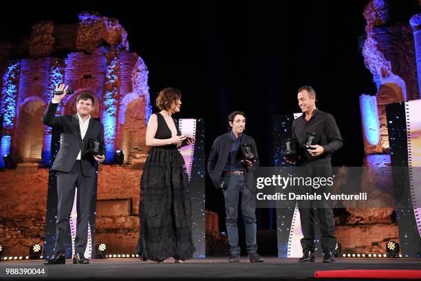 Edoardo Pesce, Carlotta Proietti, Marcello Fonte and Matteo Garrone are awarded during the Nastri D'Argento Award Ceremony on June 30, 2018 in...