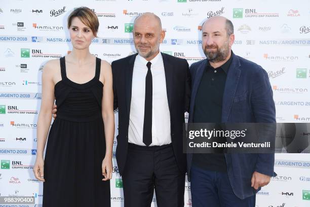 Paola Cortellesi, Riccardo Milani and Antonio Albanese attend the Nastri D'Argento cocktail party on June 30, 2018 in Taormina, Italy.