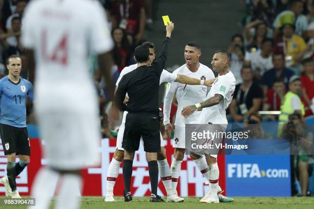 Referee Cesar Ramos, Andre Silva of Portugal, Cristiano Ronaldo of Portugal, Ricardo Quaresma of Portugal during the 2018 FIFA World Cup Russia round...