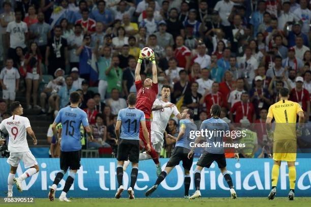 Andre Silva of Portugal, Matias Vecino of Uruguay, Cristhian Stuani of Uruguay, Uruguay goalkeeper Fernando Muslera, Jose Fonte of Portugal, Diego...