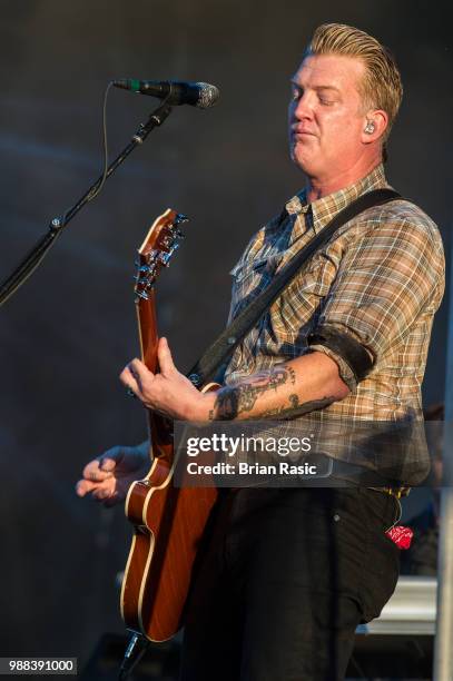 Josh Homme of Queens of the Stone Age performs live on stage at Finsbury Park on June 30, 2018 in London, England.