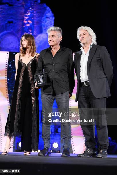 Kasia Smutniak, Luciano Ligabue and Domenico Procacci are awarded during the Nastri D'Argento Award Ceremony on June 30, 2018 in Taormina, Italy.