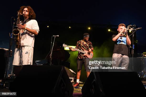 James Mollison, TJ Koleoso and Dylan Jones of Ezra Collective peroform on the Arena Stage on day 2 of Love Supreme Festival on June 30, 2018 in...