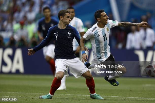 Angel Di Maria of Argentina vies Antoine Griezmann of France team during the 2018 FIFA World Cup Russia Round of 16 match between France and...