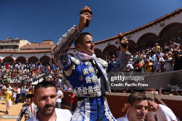 Spanish bullfighter Enrique Ulises performs with a Laura Velasco ranch fighting bull during a bullfight at the 'La Chata' bullring in Soria, north of...