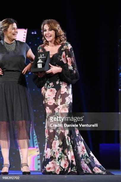 Claudia Gerini is awarded during the Nastri D'Argento Award Ceremony on June 30, 2018 in Taormina, Italy.