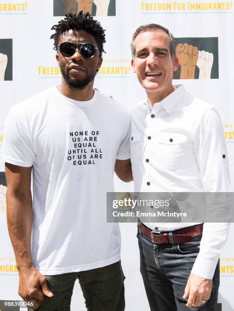 Actor Chadwick Boseman and mayor Eric Garcetti attend 'Families Belong Together - Freedom for Immigrants March Los Angeles' at Los Angeles City Hall...