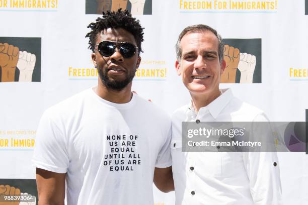 Actor Chadwick Boseman and mayor Eric Garcetti attend 'Families Belong Together - Freedom for Immigrants March Los Angeles' at Los Angeles City Hall...