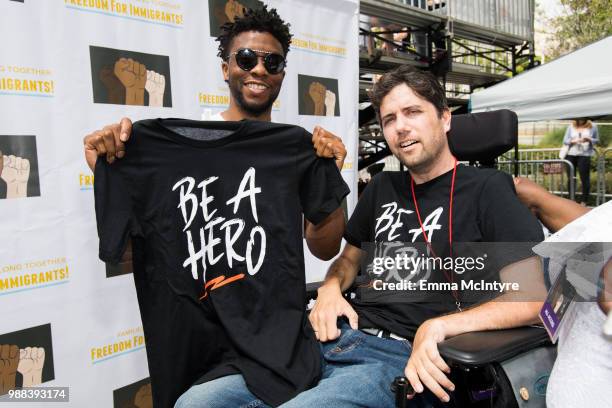 Actor Chadwick Boseman and activist Ady Barkan attend 'Families Belong Together - Freedom for Immigrants March Los Angeles' at Los Angeles City Hall...