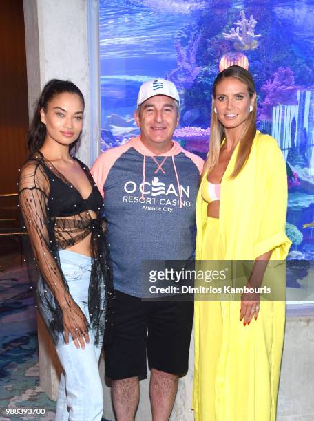 Model Shanina Shaik, Owner of the Ocean Resort Casino Bruce Deifik and Model Heidi Klum attend HQ2 Beachclub Opening at Ocean Resort Casino on June...