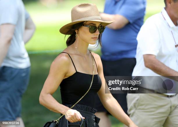 Allison Stokke, fiance of Rickie Fowler, looks on during the third round of the Quicken Loans National at TPC Potomac on June 30, 2018 in Potomac,...