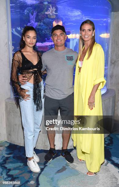 Shanina Shaik, Frank Ruocco and Heidi Klum attend HQ2 Beachclub Opening at Ocean Resort Casino on June 30, 2018 in Atlantic City, New Jersey.