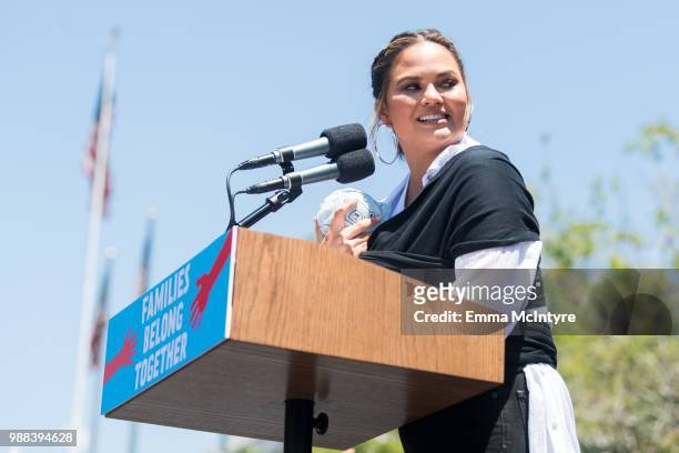 Chrissy Teigen speaks onstage at 'Families Belong Together - Freedom for Immigrants March Los Angeles' at Los Angeles City Hall on June 30, 2018 in...