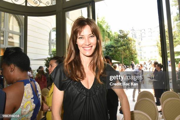 Miss France1999 Mareva Galanter poses during the Bleu Comme Gris Childrenswear show At Hotel Ritz on June 30, 2018 in Paris, France.