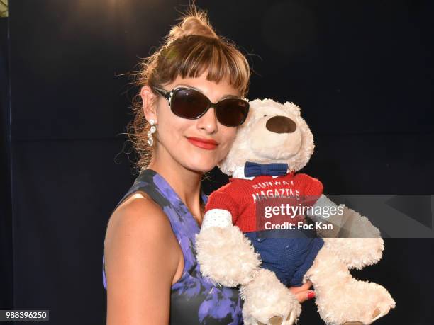 Abigail Lopez Cruz from Runway Magazine poses during the Bleu Comme Gris Childrenswear show At Hotel Ritz on June 30, 2018 in Paris, France.