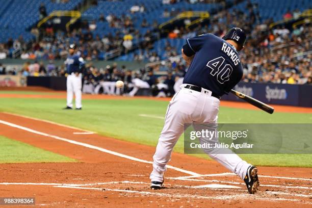 Wilson Ramos of the Tampa Bay Rays hits a double in the first inning against the Houston Astros on June 30, 2018 at Tropicana Field in St Petersburg,...