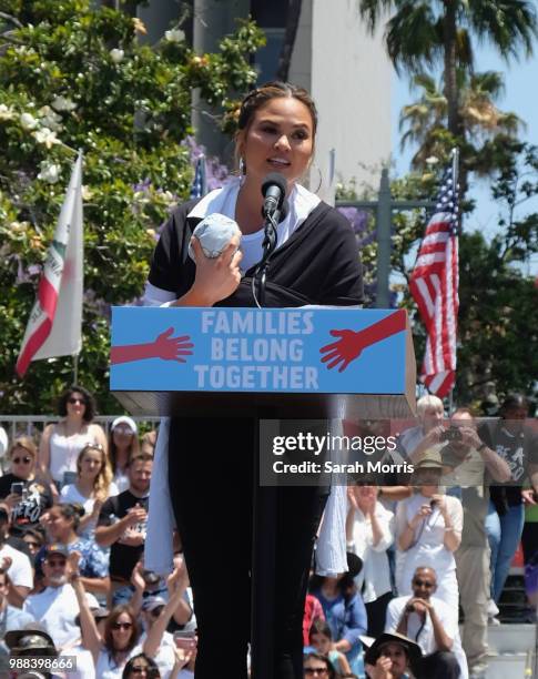 Chrissy Teigen speaks at the Families Belong Together - Freedom For Immigrants March at Los Angeles City Hall on June 30, 2018 in Los Angeles,...