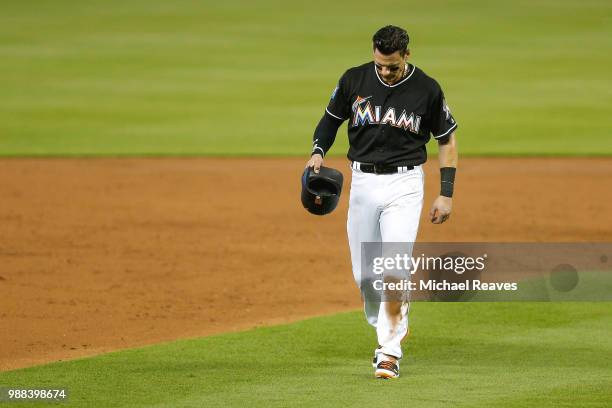 Derek Dietrich of the Miami Marlins reacts against the New York Mets at Marlins Park on June 30, 2018 in Miami, Florida.