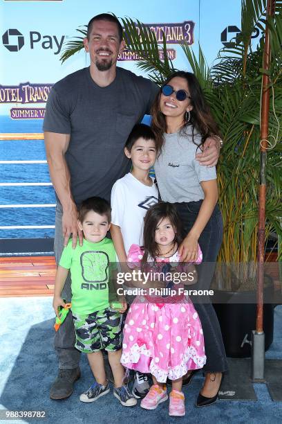 Steve Howey, Sarah Shahi, and family attend the Columbia Pictures and Sony Pictures Animation's world premiere of "Hotel Transylvania 3: Summer...