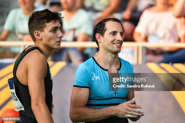Armand Duplantis of Sweden and Renaud Lavillenie of France during the Pole Vault of the Meeting of Paris on June 30, 2018 in Paris, France.