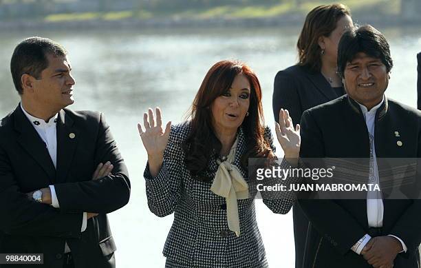 Presidents Rafael Correa of Ecuador , Cristina Fernandez de Kirchner of Argentina and Evo Morales of Bolivia, gesture as they pose for the family...