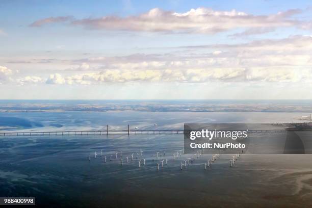 Arial view of the Wind Farm near The Øresund Bridge, Sweden, on 26 June 2018. The Øresund Bridge, a combined railway and motorway bridge between...