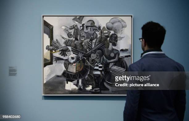 Visitor stands in front of the painting 'Moma Angus Picasso' during a press preview of the exhibition 'Patrick Angus. Private Show' at the...